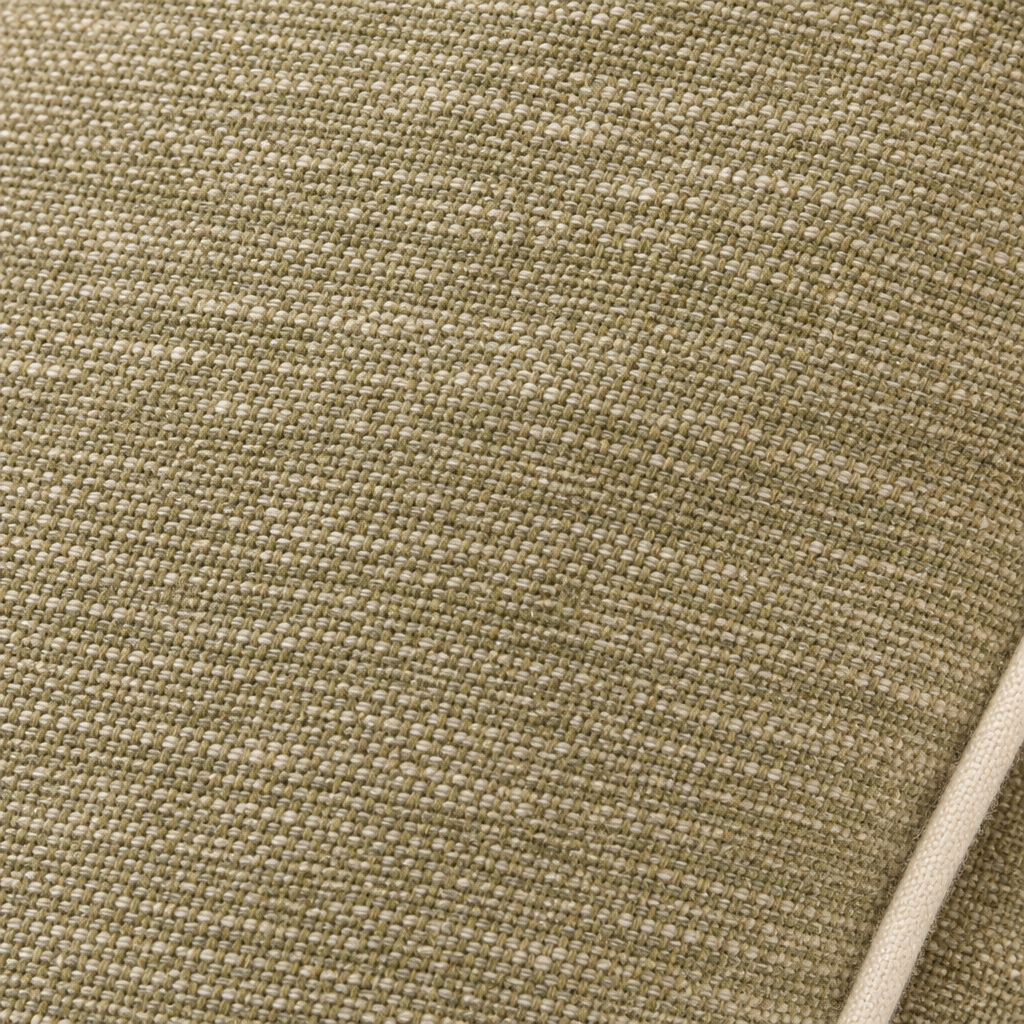 Detalle de la tela jaspeada de lino verde con vivo crema