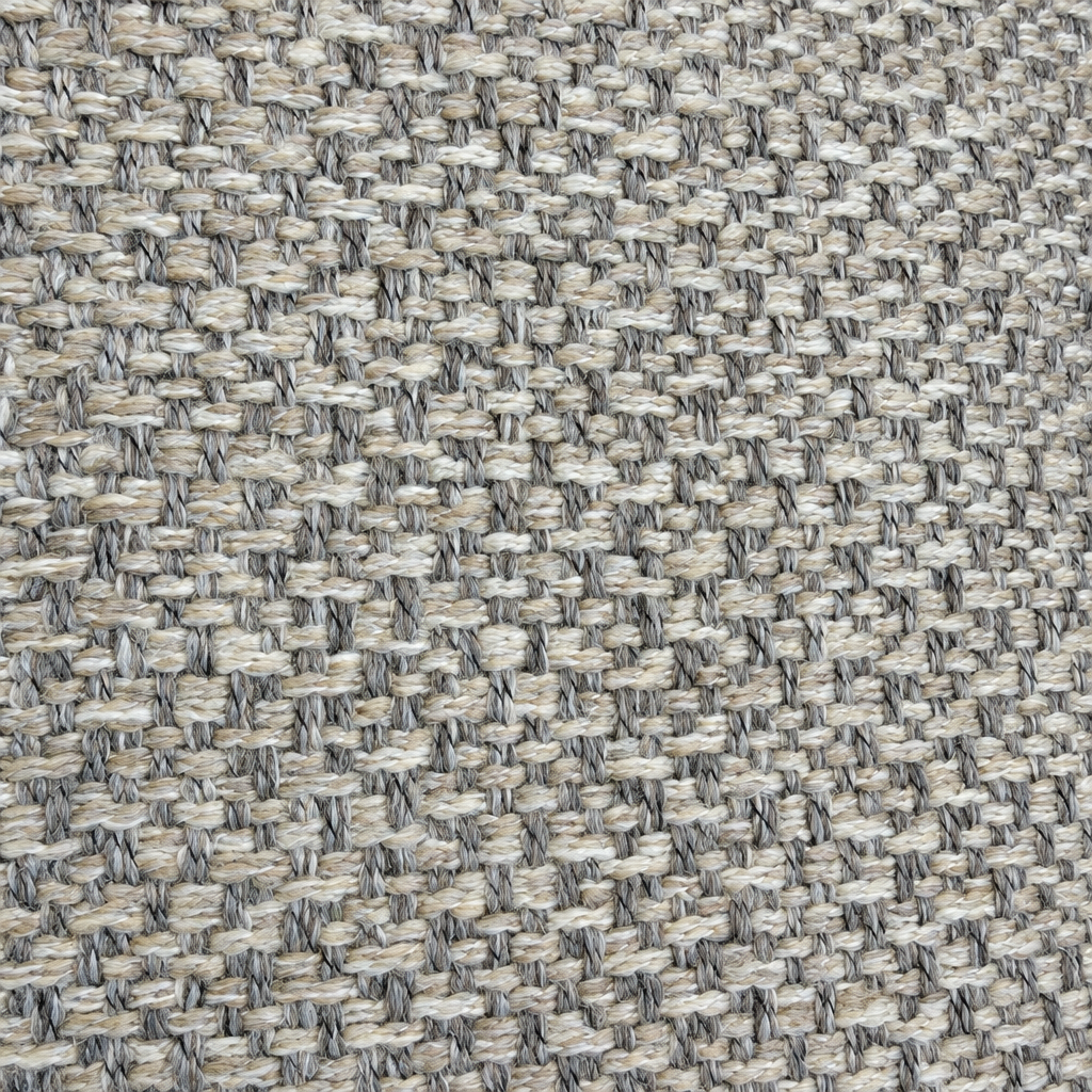 Primer plano de la trama entrelazada beige y gris del Cojín Jaspeado